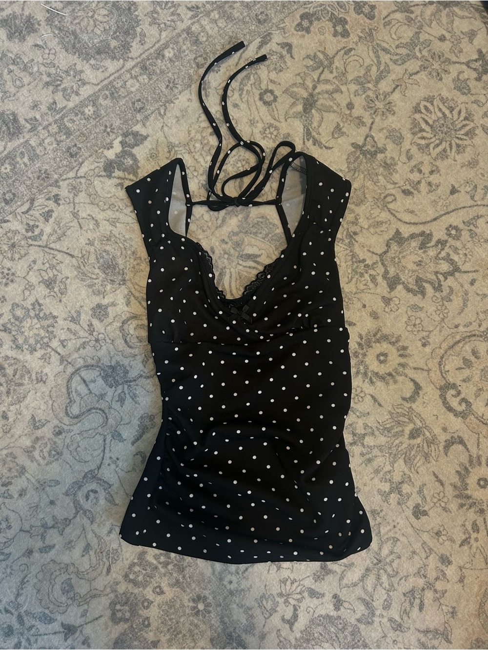 black polka dot top